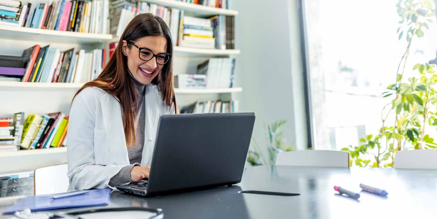 Clinician using laptop