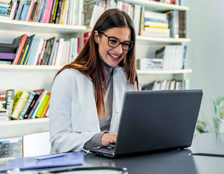 Clinician using laptop