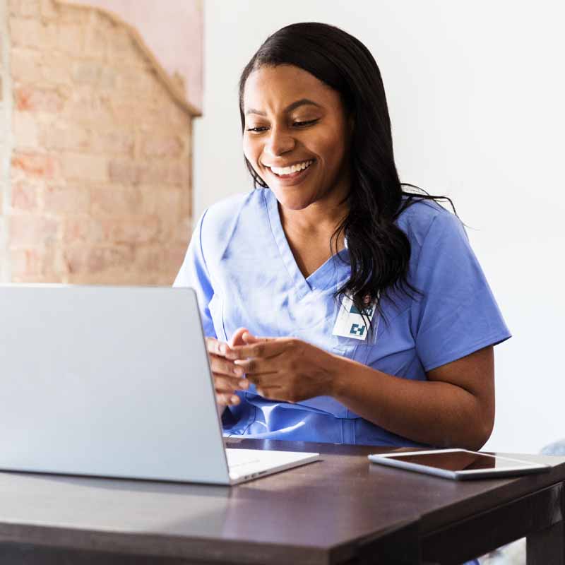 Clinician using laptop