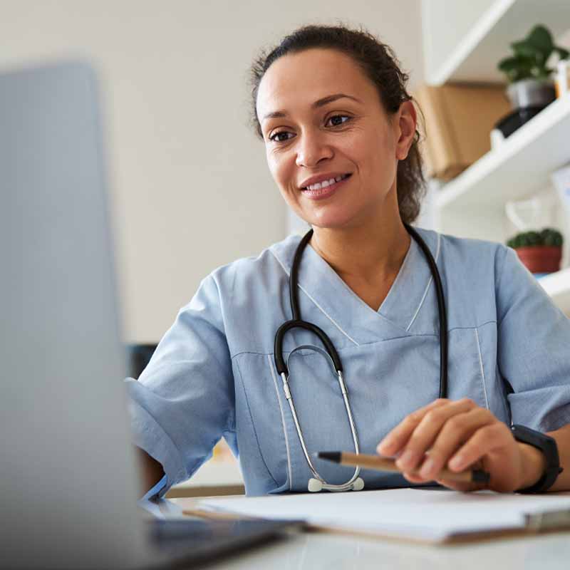 Clinician using laptop