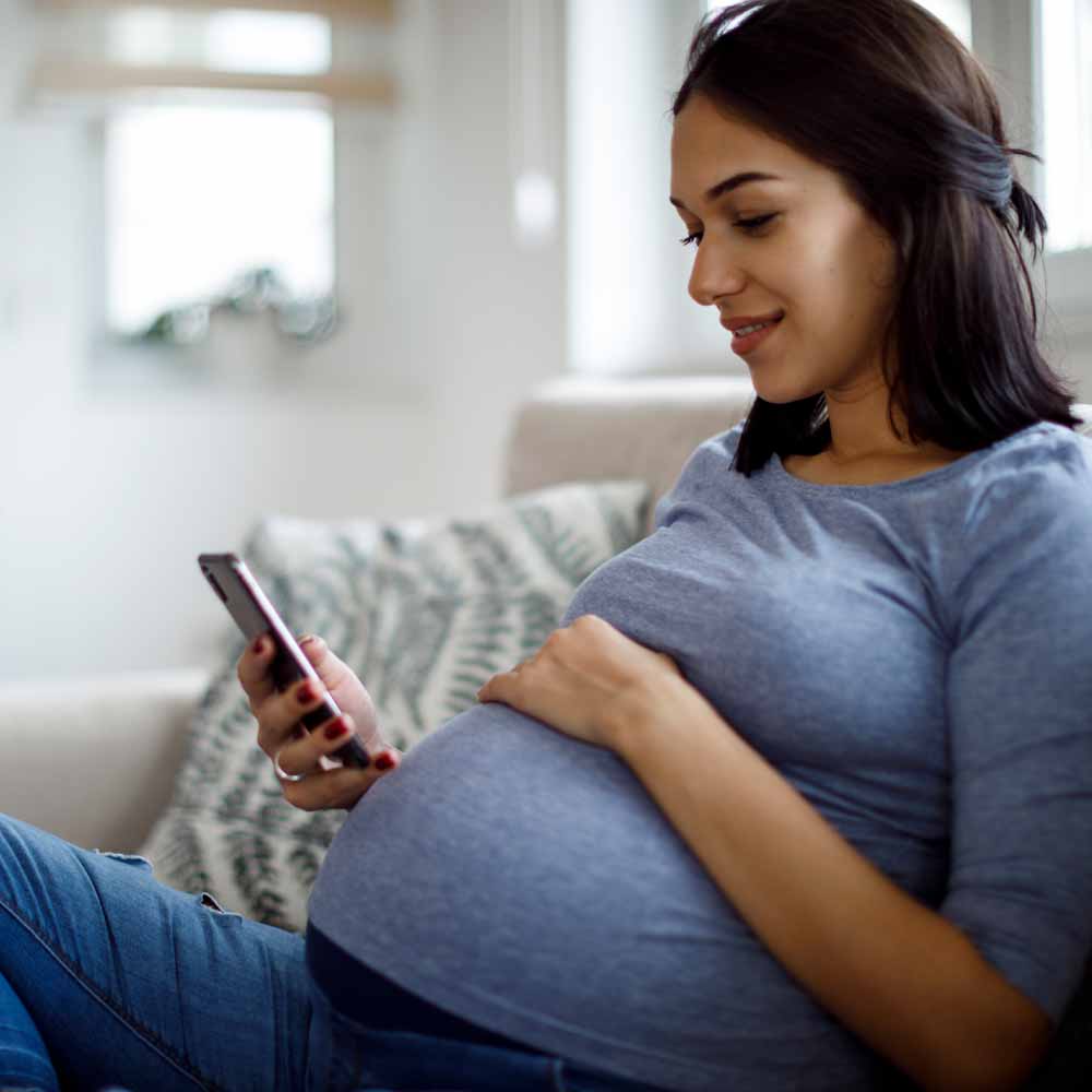 Pregnant woman using app